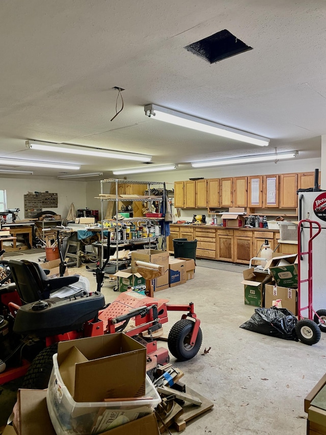 5882 Willow Ln, Crestview, FL 32539 - garage featuring a workshop area