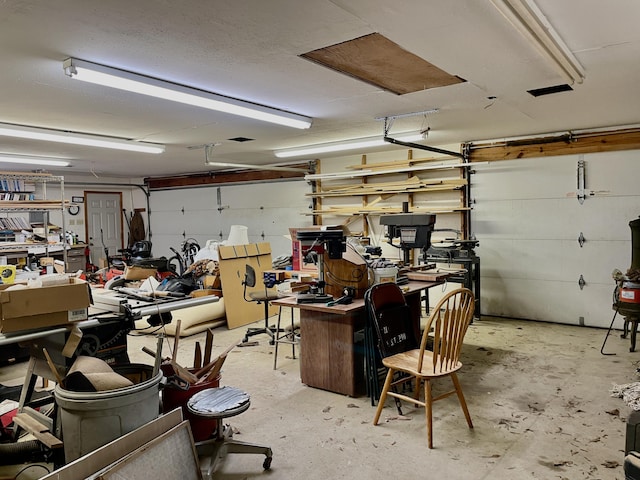 5882 Willow Ln, Crestview, FL 32539 - garage featuring a workshop area