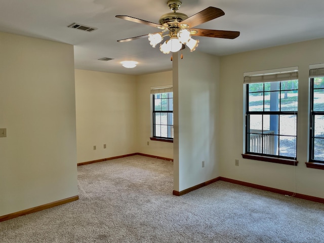 5882 Willow Ln, Crestview, FL 32539 - empty room with carpet, ceiling fan, and baseboards