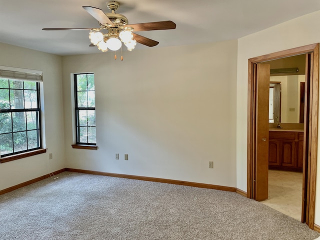 5882 Willow Ln, Crestview, FL 32539 - carpeted spare room featuring ceiling fan and baseboards