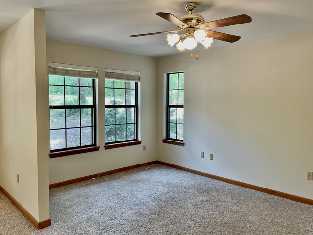 5882 Willow Ln, Crestview, FL 32539 - carpeted spare room with a ceiling fan and baseboards