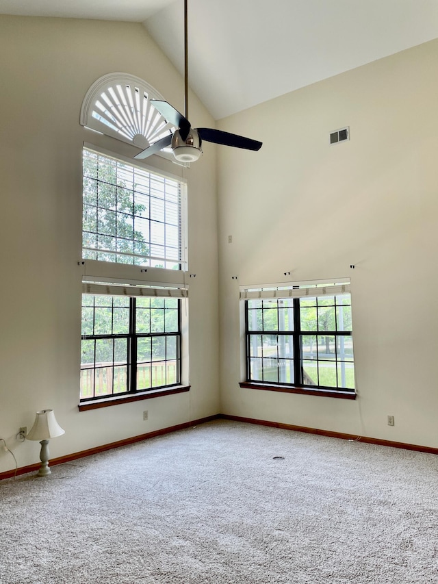 5882 Willow Ln, Crestview, FL 32539 - unfurnished room with carpet flooring, high vaulted ceiling, baseboards, and ceiling fan