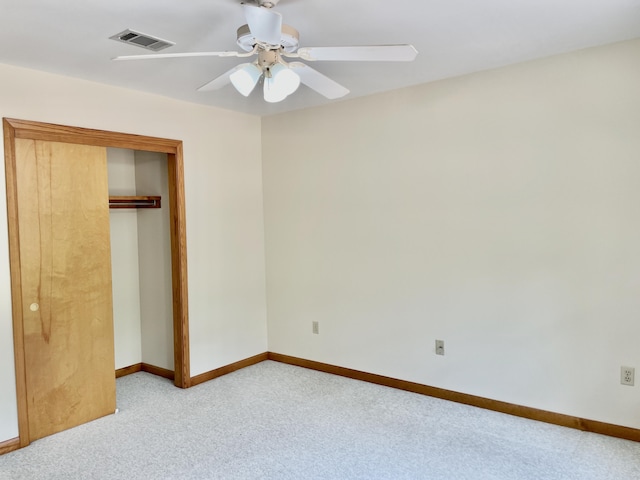 5882 Willow Ln, Crestview, FL 32539 - unfurnished bedroom featuring carpet, baseboards, a closet, and ceiling fan