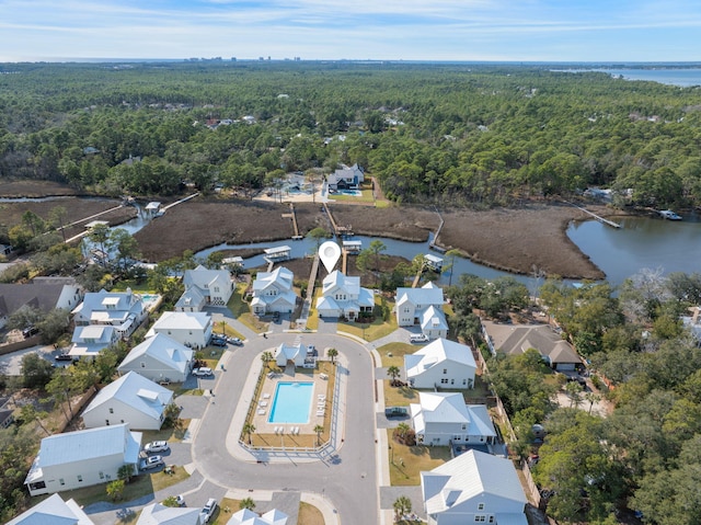 180 Bayou Edge Lndg, Santa Rosa Beach, FL 32459 - aerial overview of property's location with a heavily wooded area, a large body of water, and nearby suburban area