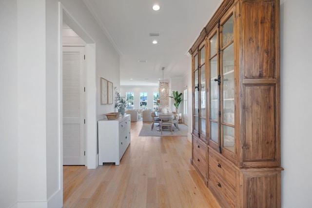 180 Bayou Edge Lndg, Santa Rosa Beach, FL 32459 - hall with light wood-style floors, recessed lighting, ornamental molding, and baseboards
