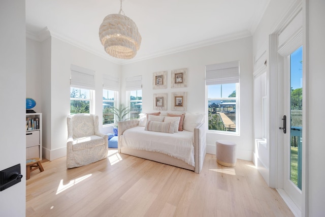 180 Bayou Edge Lndg, Santa Rosa Beach, FL 32459 - bedroom with wood finished floors, multiple windows, and ornamental molding