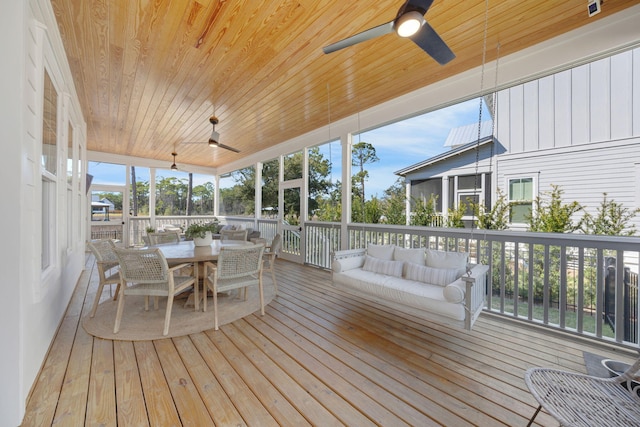 180 Bayou Edge Lndg, Santa Rosa Beach, FL 32459 - sunroom / solarium featuring ceiling fan, outdoor dining space, and an outdoor hangout area
