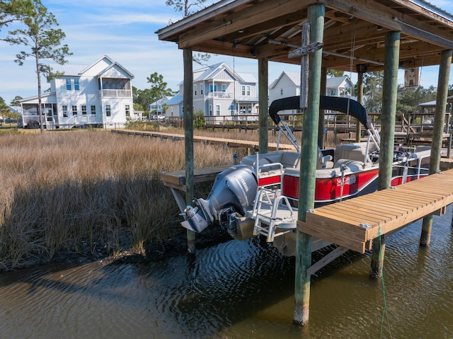 180 Bayou Edge Lndg, Santa Rosa Beach, FL 32459 - dock with a water view and boat lift