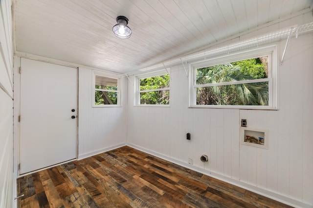 laundry area featuring electric dryer hookup, dark wood finished floors, plenty of natural light, and hookup for a washing machine