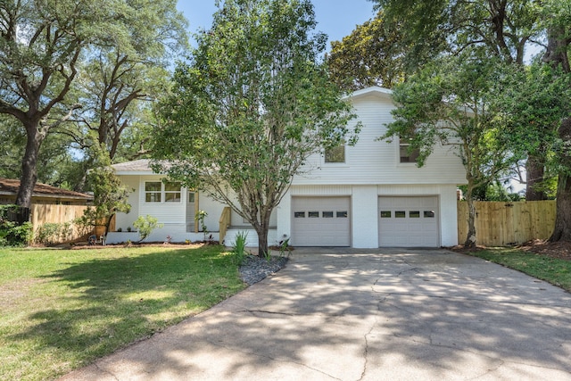 20 NW Higdon Ct, Fort Walton Beach, FL 32547 - view of front of home featuring concrete driveway, an attached garage, and brick siding