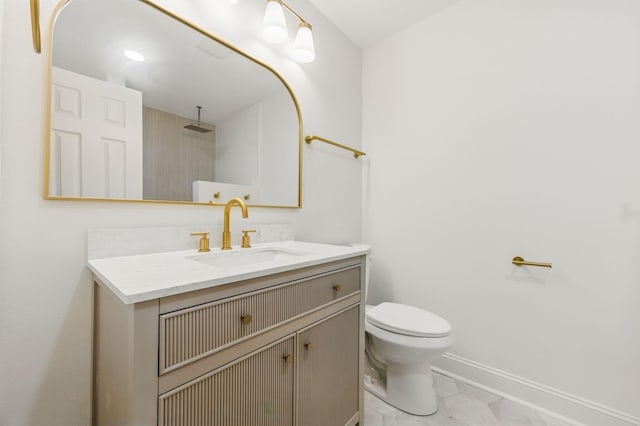 20 NW Higdon Ct, Fort Walton Beach, FL 32547 - bathroom featuring toilet, vanity, baseboards, and a shower