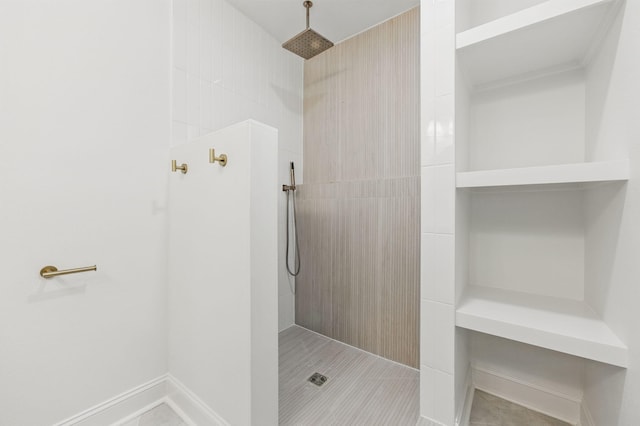 20 NW Higdon Ct, Fort Walton Beach, FL 32547 - bathroom featuring tiled shower, tile patterned flooring, and tile walls