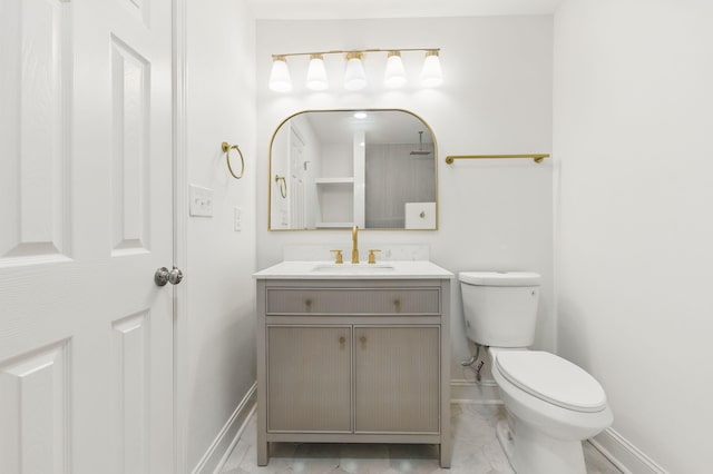20 NW Higdon Ct, Fort Walton Beach, FL 32547 - full bath with toilet, vanity, baseboards, a shower, and marble finish floors