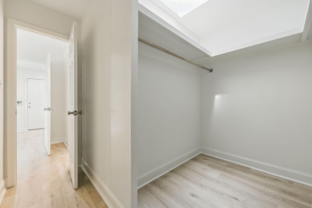 20 NW Higdon Ct, Fort Walton Beach, FL 32547 - spacious closet with light wood-type flooring and a skylight