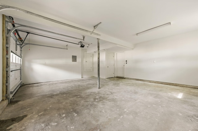 20 NW Higdon Ct, Fort Walton Beach, FL 32547 - garage featuring a garage door opener and electric panel