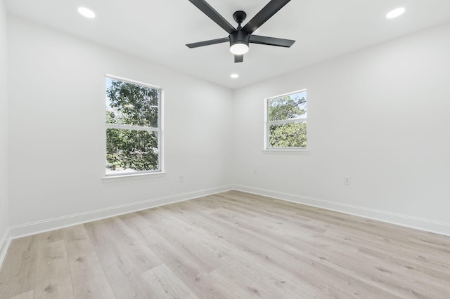 20 NW Higdon Ct, Fort Walton Beach, FL 32547 - empty room with plenty of natural light, light wood finished floors, a ceiling fan, and recessed lighting