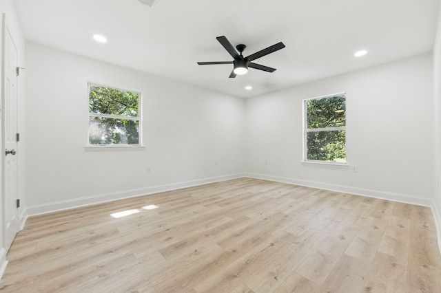20 NW Higdon Ct, Fort Walton Beach, FL 32547 - spare room with healthy amount of natural light, light wood-style flooring, recessed lighting, baseboards, and ceiling fan