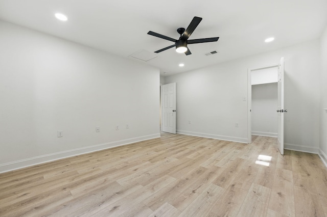 20 NW Higdon Ct, Fort Walton Beach, FL 32547 - unfurnished bedroom with light wood-type flooring, recessed lighting, baseboards, ceiling fan, and a spacious closet