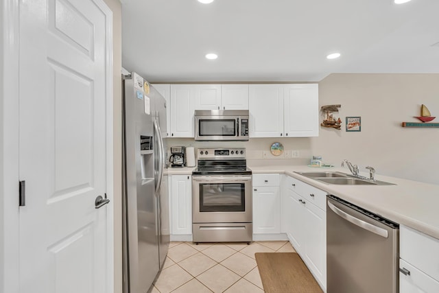 2076 Scenic Gulf Dr Unit 4011, Miramar Beach, FL 32550 - kitchen featuring stainless steel appliances, a sink, light tile patterned flooring, light countertops, and recessed lighting