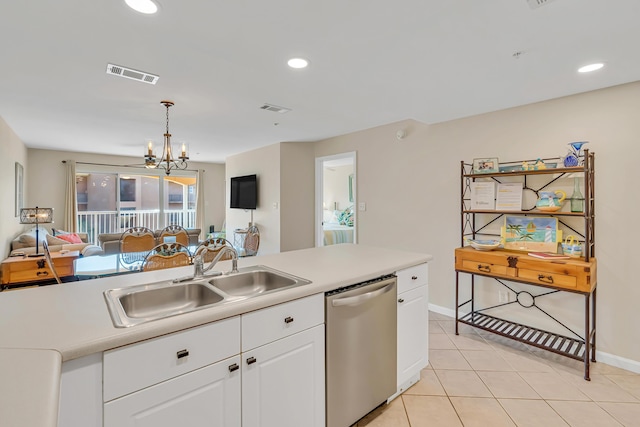 2076 Scenic Gulf Dr Unit 4011, Miramar Beach, FL 32550 - kitchen featuring stainless steel dishwasher, a sink, open floor plan, light tile patterned floors, and white cabinetry