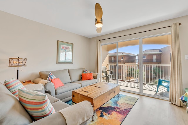 2076 Scenic Gulf Dr Unit 4011, Miramar Beach, FL 32550 - living room featuring wood finished floors and a ceiling fan