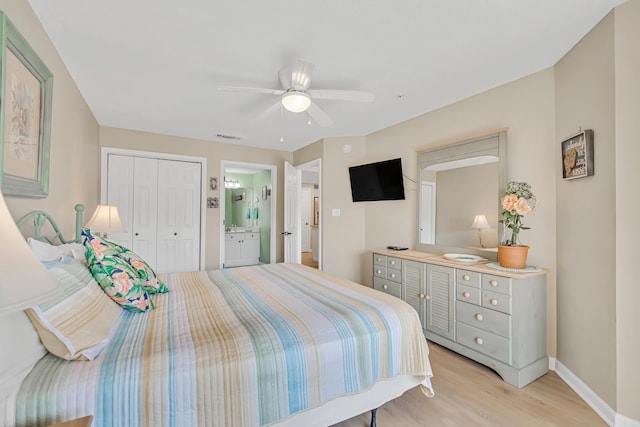 2076 Scenic Gulf Dr Unit 4011, Miramar Beach, FL 32550 - bedroom with light wood finished floors, baseboards, a closet, ensuite bathroom, and ceiling fan