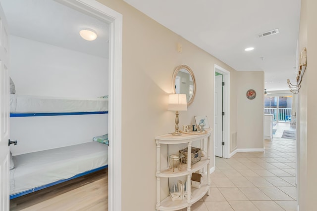 2076 Scenic Gulf Dr Unit 4011, Miramar Beach, FL 32550 - hall with tile patterned flooring, baseboards, and recessed lighting