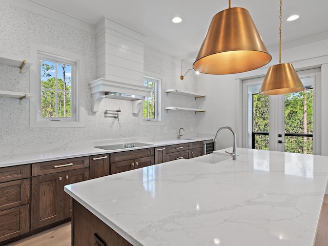 173 Crissman Rd, Santa Rosa Beach, FL 32459 - kitchen featuring open shelves, a sink, black electric cooktop, plenty of natural light, and recessed lighting