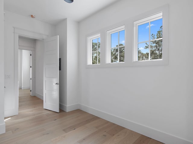 173 Crissman Rd, Santa Rosa Beach, FL 32459 - unfurnished bedroom with baseboards and light wood finished floors