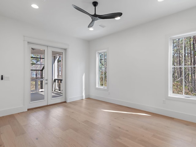 173 Crissman Rd, Santa Rosa Beach, FL 32459 - empty room with plenty of natural light, french doors, ceiling fan, light wood-style floors, and recessed lighting