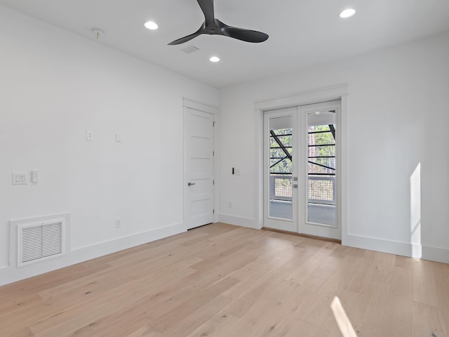173 Crissman Rd, Santa Rosa Beach, FL 32459 - spare room featuring french doors, light wood-style floors, recessed lighting, and baseboards