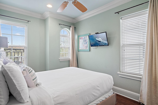 1843 Boardwalk Dr, Sandestin, FL 32550 - bedroom featuring wood finished floors, ornamental molding, baseboards, and a ceiling fan