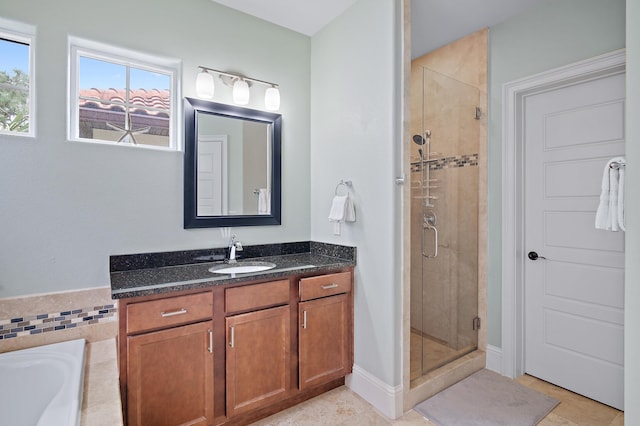 1843 Boardwalk Dr, Sandestin, FL 32550 - bathroom featuring a stall shower, tile patterned floors, vanity, and a tub to relax in