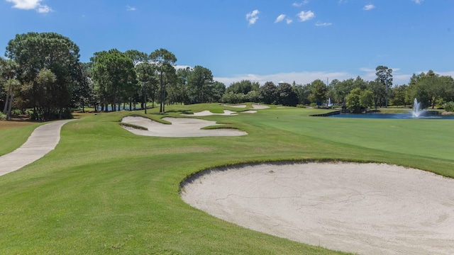 1843 Boardwalk Dr, Sandestin, FL 32550 - view of home's community with view of scattered trees, a yard, view of golf course, and a water view