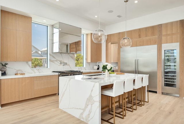 238 Sand Oaks Cir, Santa Rosa Beach, FL 32459 - kitchen featuring built in refrigerator, wine cooler, modern cabinets, a sink, and recessed lighting