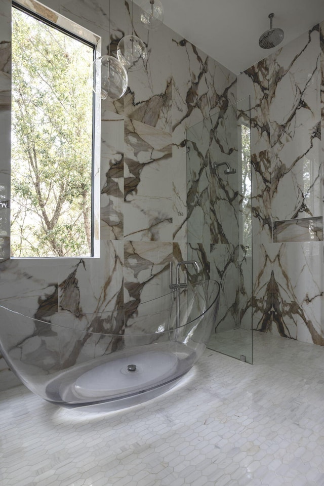 238 Sand Oaks Cir, Santa Rosa Beach, FL 32459 - bathroom with plenty of natural light, a marble finish shower, and tile walls