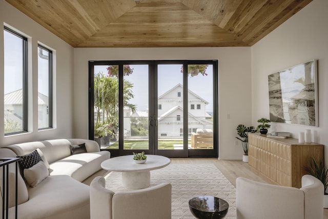 238 Sand Oaks Cir, Santa Rosa Beach, FL 32459 - living area featuring wood ceiling, healthy amount of natural light, light wood-type flooring, and lofted ceiling