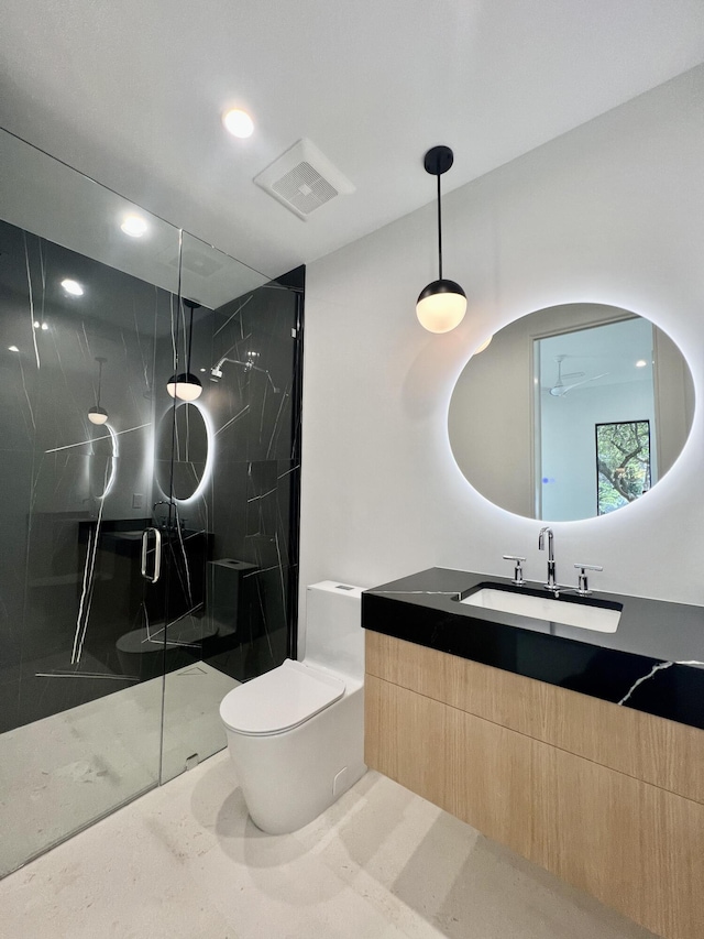 238 Sand Oaks Cir, Santa Rosa Beach, FL 32459 - bathroom featuring a marble finish shower, toilet, recessed lighting, and vanity
