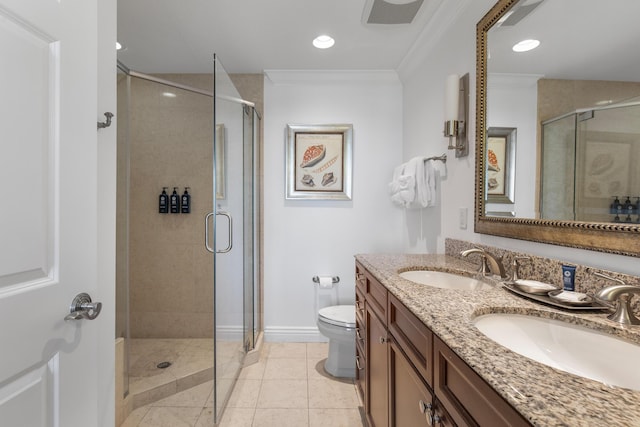 10 Harbor Blvd Unit E409, Destin, FL 32541 - bathroom with double vanity, a stall shower, ornamental molding, toilet, and baseboards