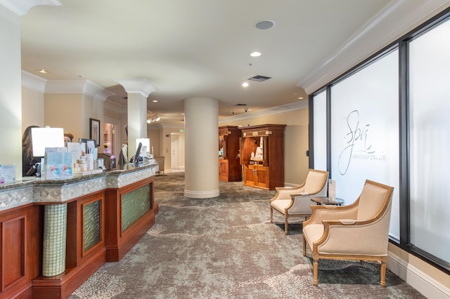 10 Harbor Blvd Unit E409, Destin, FL 32541 - reception area featuring crown molding, decorative columns, and recessed lighting
