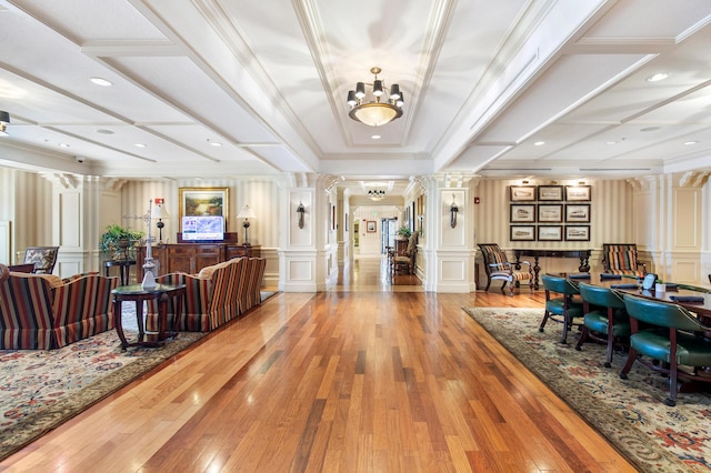 10 Harbor Blvd Unit E409, Destin, FL 32541 - lobby featuring a decorative wall, ornamental molding, and a wainscoted wall