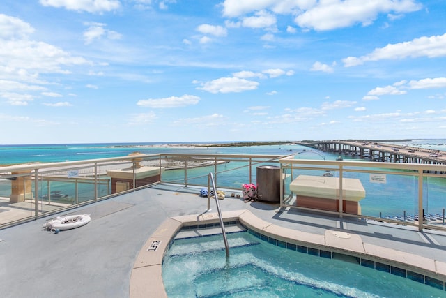 10 Harbor Blvd Unit E409, Destin, FL 32541 - view of pool with a water view, a pool, and a community hot tub