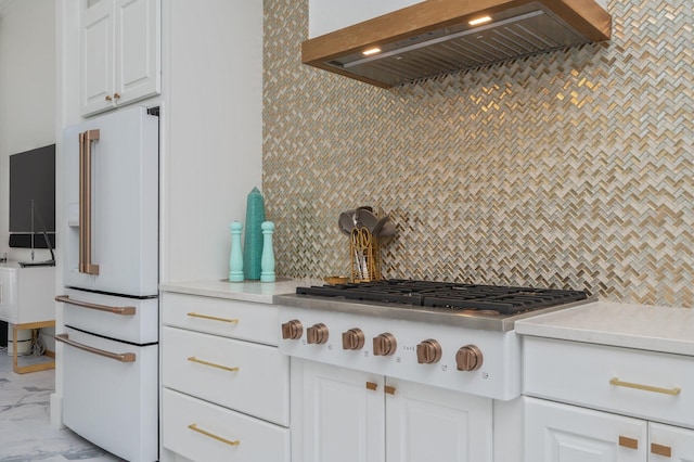 6290 Augusta Cv, Destin, FL 32541 - kitchen featuring custom range hood, high end white refrigerator, stainless steel gas stovetop, tasteful backsplash, and light countertops