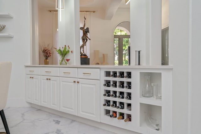 6290 Augusta Cv, Destin, FL 32541 - bar with light marble finish floors