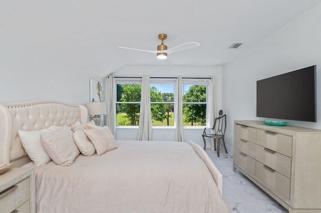 6290 Augusta Cv, Destin, FL 32541 - bedroom with light marble finish floors, vaulted ceiling, and ceiling fan