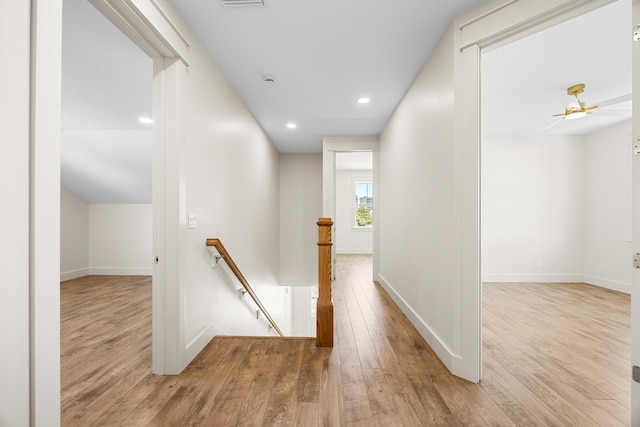 6424 Sunset Ave, Panama City Beach, FL 32408 - hall featuring an upstairs landing, wood finished floors, baseboards, and recessed lighting