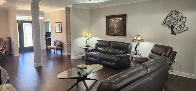 3100 Oriole Dr, Gulf Breeze, FL 32563 - living room featuring decorative columns, ornamental molding, wood finished floors, and baseboards
