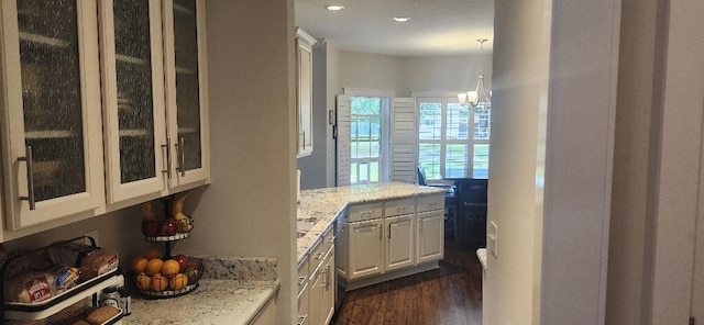 3100 Oriole Dr, Gulf Breeze, FL 32563 - bar area with dark wood-style floors, a chandelier, recessed lighting, and decorative light fixtures