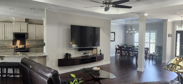 3100 Oriole Dr, Gulf Breeze, FL 32563 - living room with crown molding, dark wood finished floors, baseboards, a ceiling fan, and decorative columns