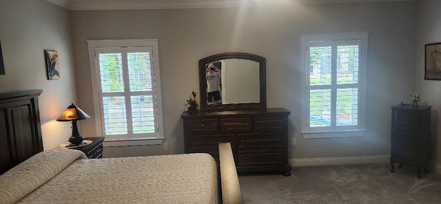 3100 Oriole Dr, Gulf Breeze, FL 32563 - bedroom featuring multiple windows, carpet, baseboards, and crown molding